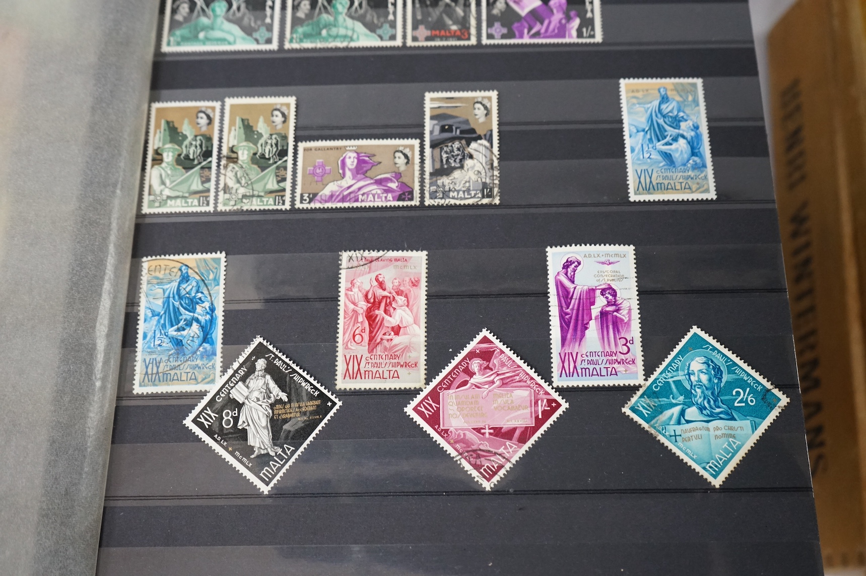 Four albums of stamps: Newfoundland, Jamaica etc (4). Condition - mostly stamp marked